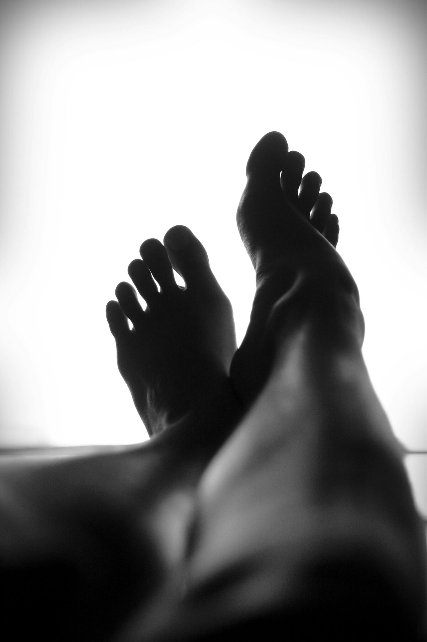 Bare feet, ready for a foot reflexology massage