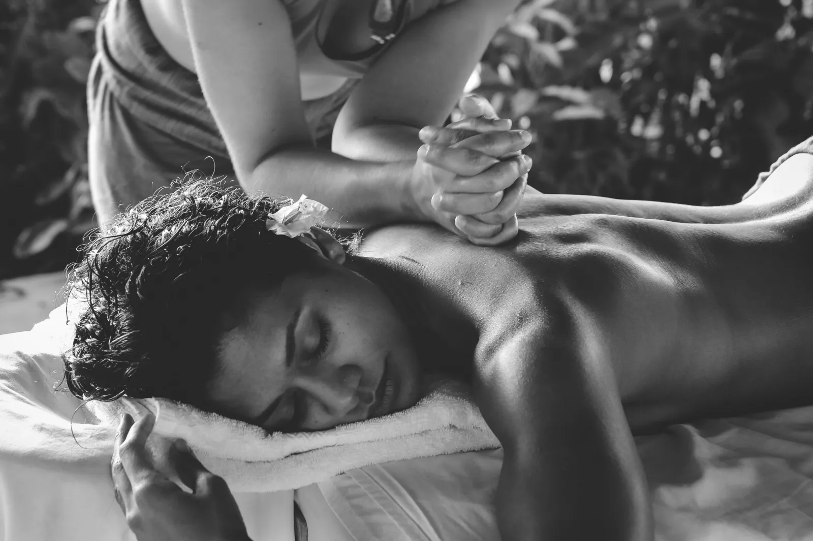 Woman receiving a Swedish massage on her back